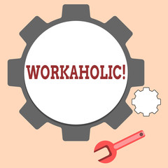 Handwriting text writing Workaholic. Concept meaning Person who compulsively works excessively hard and long hours