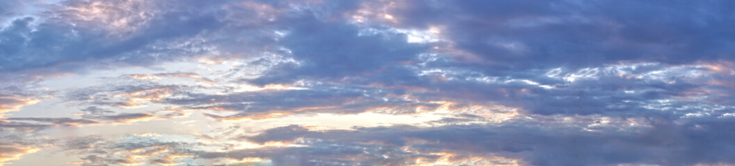 Parnorama sun light ray on cloudy with blue sky background in the evening twilight period.