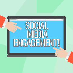 Conceptual hand writing showing Social Media Engagement. Business photo showcasing Communicating in an online community platforms Hu analysis Hands Pointing on a Blank Color Tablet Screen