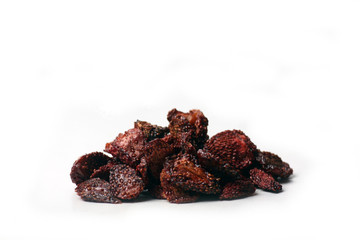 A pile of dried strawberries on white background