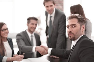 Business people doing handshake after agreement