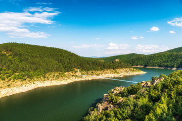Fototapeta premium Suspension bridge over Kardzhali dam, Bulgaria near Suhovo village