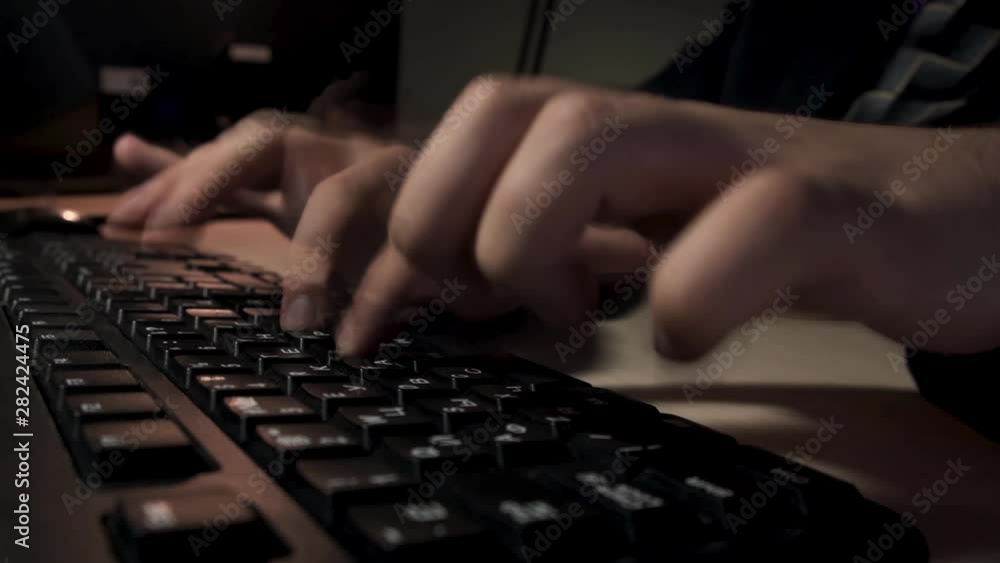 Poster close up for man hands typing something on computer keyboard, office work concept. stock footage. ma