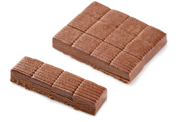 oriental; tradition; dessert; sherbet; sweet; chocolate; candy; piece; carbohydrates; white; background; isolated; food; brown; dark; delicious; eat; snack; gourmet; plate; slice; taste; sugar; ethnic