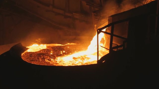 draining the molten metal from the furnace