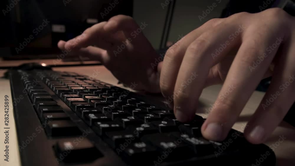 Aufkleber close up for man hands typing something on computer keyboard, office work concept. stock footage. ma