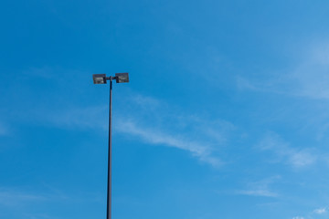 Parking lot light on a clear day