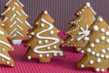 New Year's party ideas for kids. Christmas snack, cookies in shape of trees. Christmas homemade ginger cookies