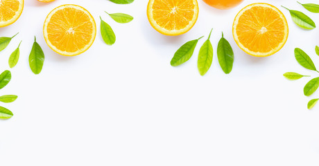 Fresh orange citrus fruit with leaves isolated on white background.