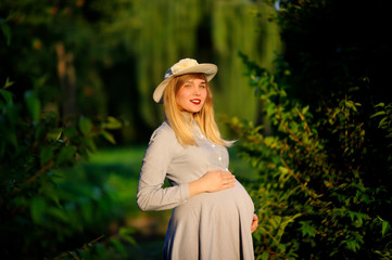 Happy pregnant woman outdoor