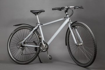old bicycle isolated on grey background