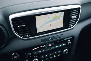Obraz na płótnie Canvas Modern car multimedia control system with navigation map mode