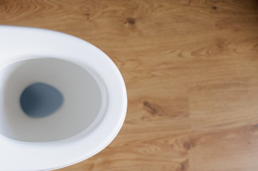 Obraz na płótnie Canvas New ceramic toilet bowl at home