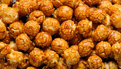 sweet Caramel Cream popcorn on the black background