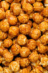 sweet Caramel Cream popcorn on the black background