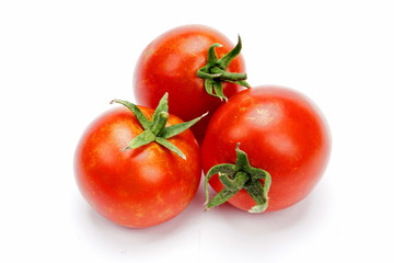 ripe fresh tomatoes isolated on white background