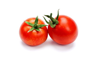 ripe fresh tomatoes isolated on white background