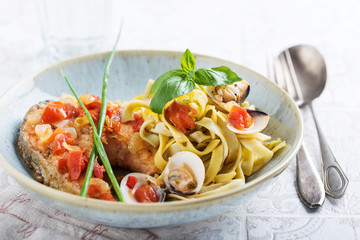 Tagliatelle with grilled salmon in a cream sauce with the addition of white wine.