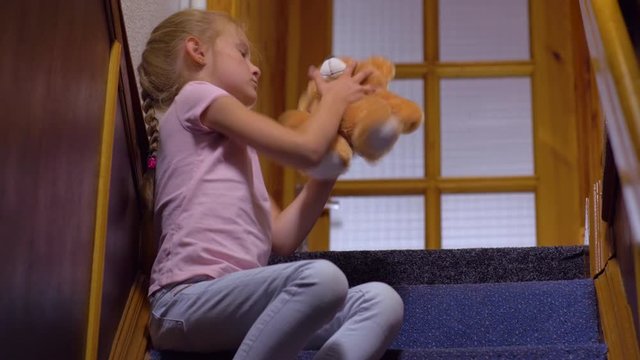 Bored Girl With Toy Bear