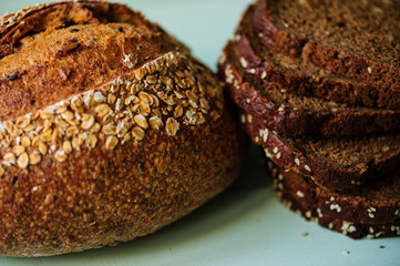 traditional bread loaf on lime wooden board