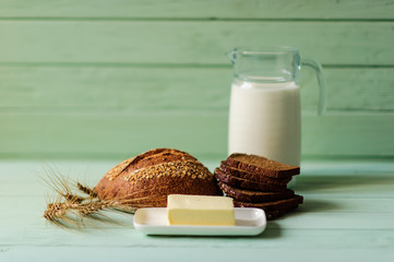 traditional bread loaf on lime wooden board
