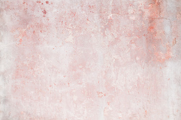 Old distressed pink wall, grungy background or texture