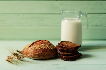 traditional bread loaf on lime wooden board