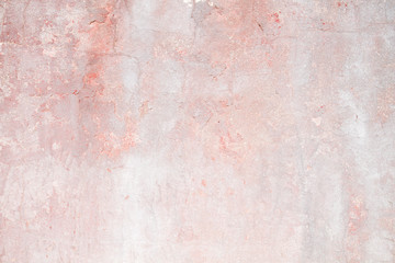 Old distressed pink wall background or texture