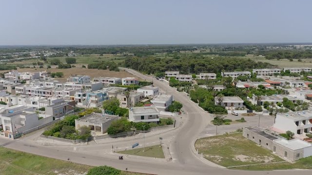 Aerial view, flight at Tower and bay of Roca Vecchia (Torre di Maradico), archaeological sites, Brindisi region, Apulia Italy