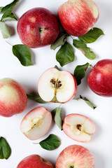 Fresh tasty and sweet apples on the table. White background.