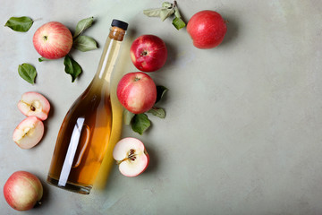 Apple cider vinegar and fresh apples, flat lay, space for your text - 282442278