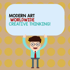 Conceptual hand writing showing Modern Art Worldwide Creative Thinking. Business photo showcasing Creativity artistic expressions Man Holding Above his Head Blank Rectangular Colored Board