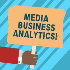 Word writing text Media Business Analytics. Business concept for Collecting and evaluating data from social media Hu analysis Hand Holding Blank Colored Placard with Stick photo Text Space