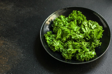 Healthy salad, leaves mix (green juicy snack). top food background - Image