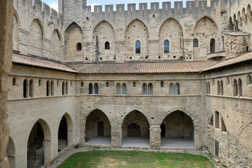 Fototapeta na wymiar Cloisters and courtyard at the Palais des Papes, Avignon , France