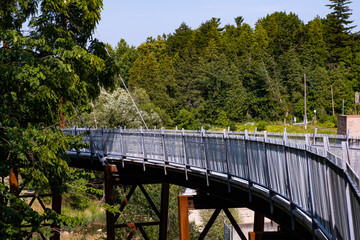 park at Markham Ontario Canada with bridge, river, and trees