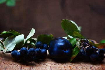 black olives on wooden table
