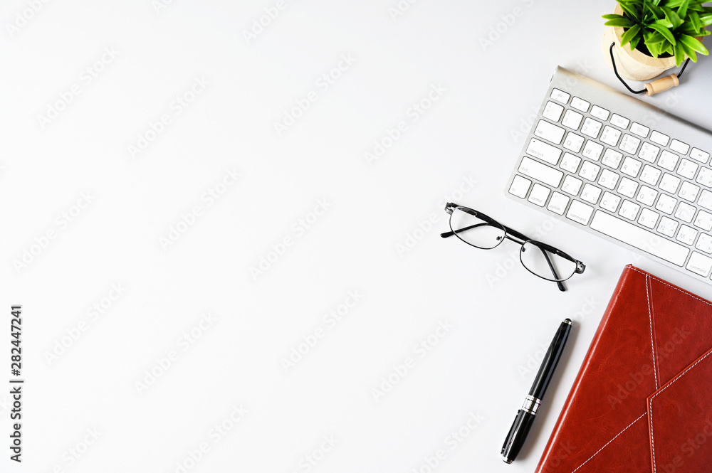 Fototapete working with keyboard computer and notebook copy space on table background.top view style.minmal wor