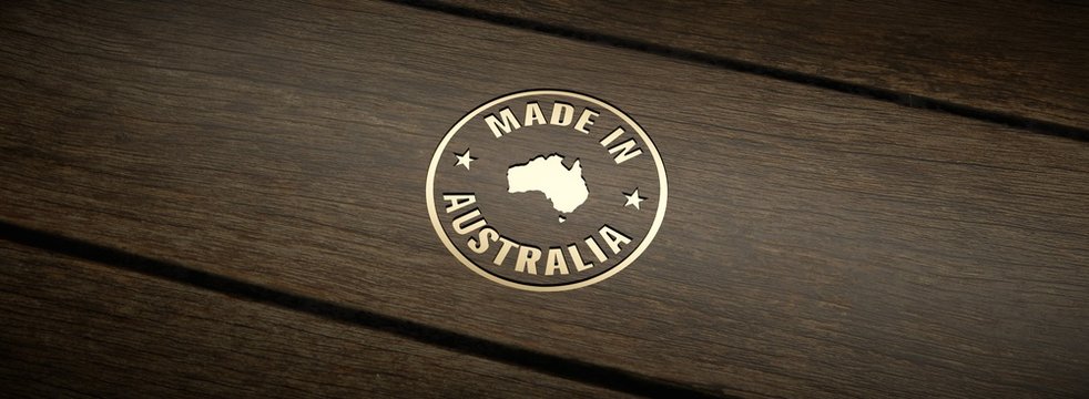 Stamp made in Australia, engraved in wood with gold inlays.