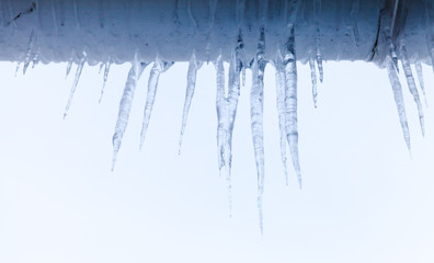 Icicles hang on the roof
