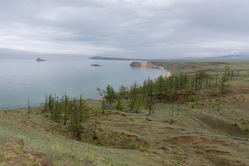 Obraz premium Olkhon island, Khuzhir village, June 2019, view of Lake Baikal on a cloudy day