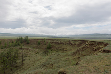 Fototapeta premium Olkhon island, Khuzhir village, June 2019, view of Lake Baikal on a cloudy day