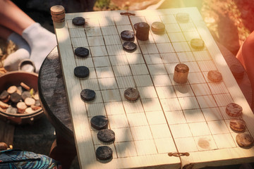Table ancient Roman game similar to checkers - latrunculorum, latrunculi, or latro. Reconstruction of a plank of wood to play together.