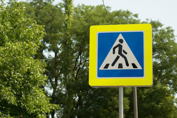 pedestrian crossing road sign in the city