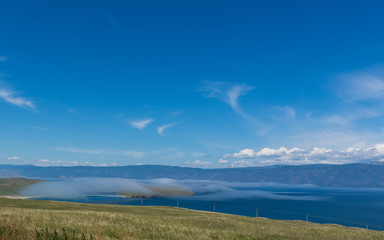 Beautiful view of Lake Baikal on a clear summer day from the shore of Olkhon Island