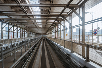 tunnel of monorail road view from front window of a moving train running