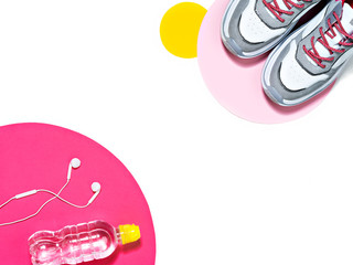 Sneakers, water and headphones.