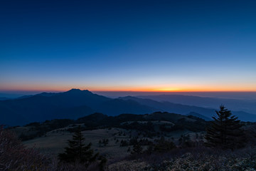 sunset in mountains during blue hour