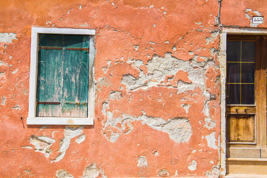 old red wall, window and door