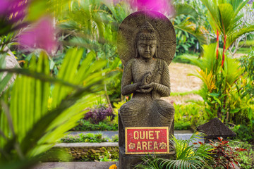 Obraz premium A sign QUIET AREA in a quiet corner of the garden